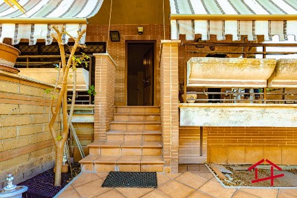 Villa a schiera via Ermanno Wolf-Ferrari, Infernetto, Roma